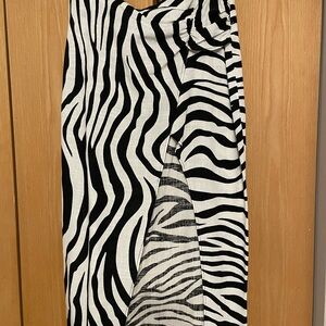 Linen, black and white zebras skirt can be used as a cover-up